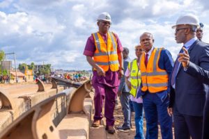 Gov Mbah (R) inspecting the collapsed New Artisan Enugu bridge that collapsed on Monday 
