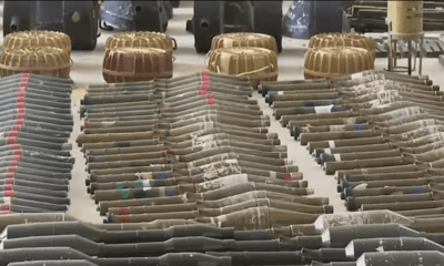 Suspected North Korean-made F-7 rocket-propelled grenades, many with a distinctive red stripe on their warhead, are seen at an Israeli military base in southern Israel, Sunday, Oct. 15, 2023