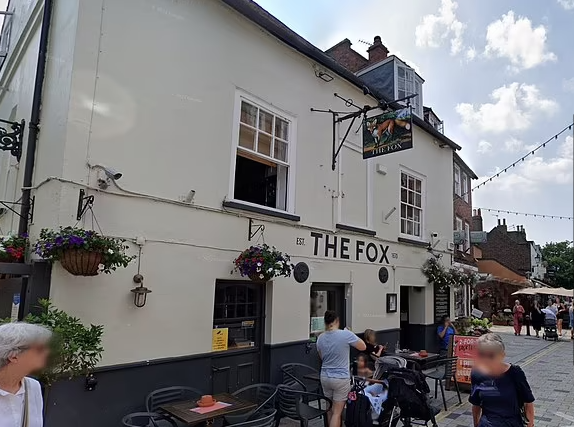 It is understood two flags were ripped from outside the Fox pub (pictured, stock image), but no other businesses on the southwest London high street were targeted