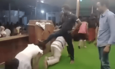 Church members crawl under pastor to cross over into a prosperous 2024 (video)