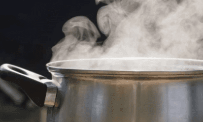 Housewife pours hot water on three children from another woman