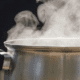 Housewife pours hot water on three children from another woman